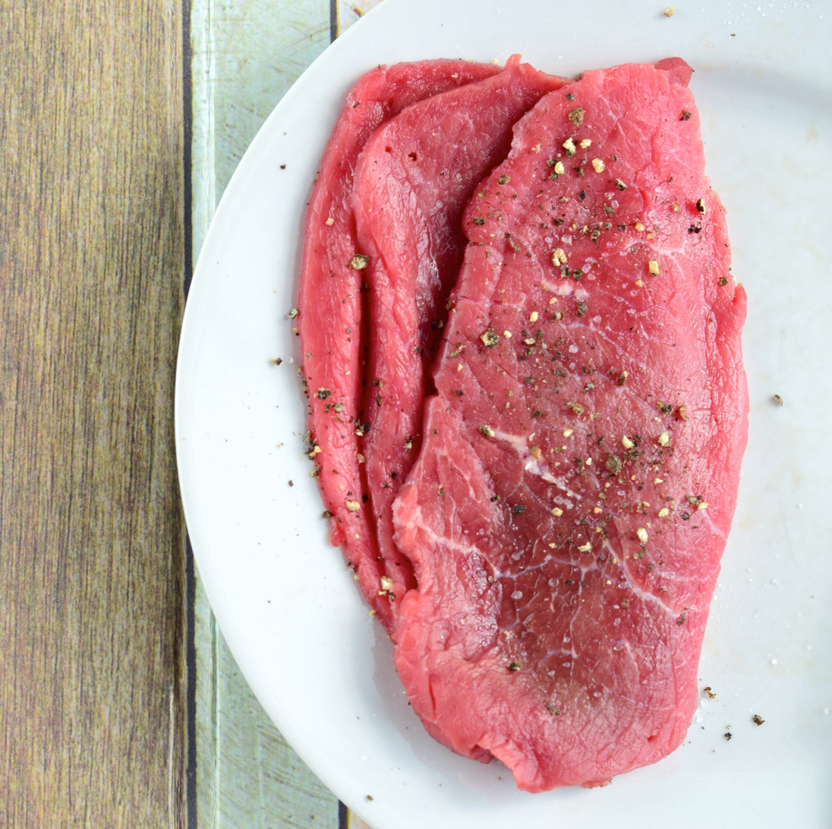 Quick Frozen Un-aged grass fed beef sandwich steak (minute steak ...